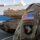 U.S. Tanks were unloaded in Bremerhaven, northern Germany, Friday Jan. 6, 2017. Ships loaded with U.S. tanks, self-propelled howitzers and hundreds of other fighting vehicles have arrived in the northern German port en route to Eastern Europe to bolster NATO’s deterrence to possible Russian aggression. (Ingo Wagner/dpa via AP)